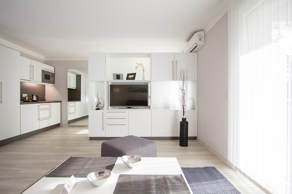 Aparthotel "Am Fliess" Хойерсверда Стая снимка