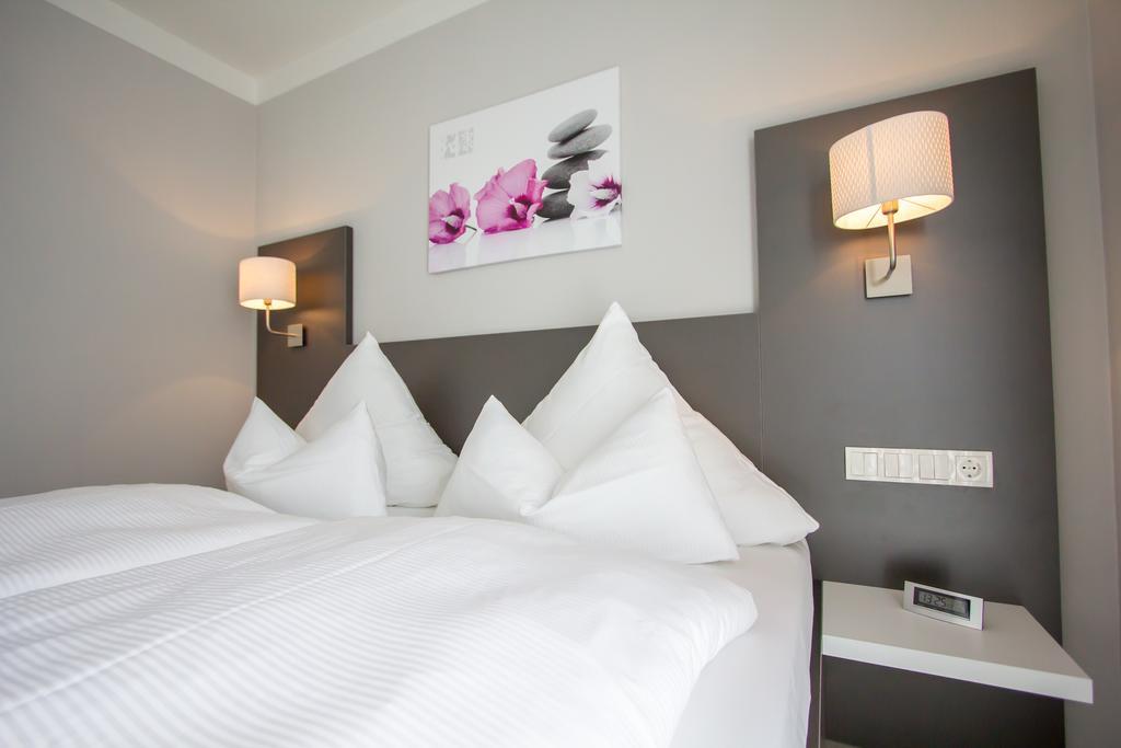 Aparthotel "Am Fliess" Хойерсверда Стая снимка