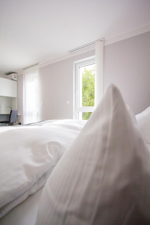 Aparthotel "Am Fliess" Хойерсверда Стая снимка