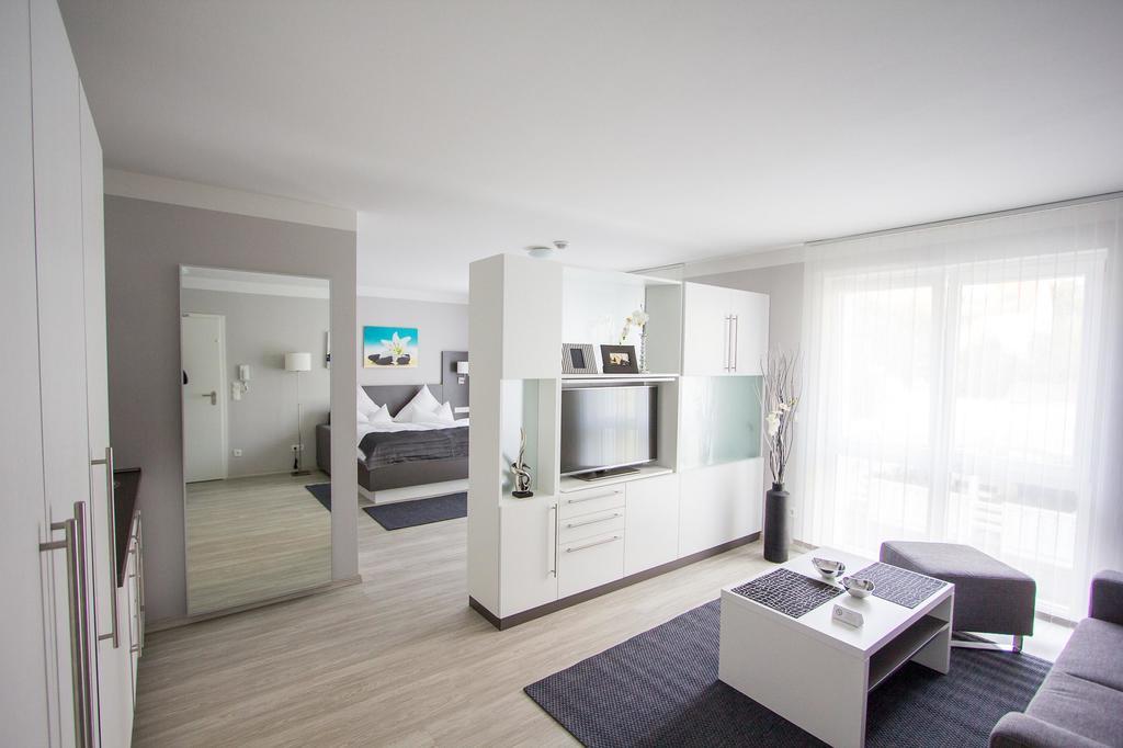 Aparthotel "Am Fliess" Хойерсверда Стая снимка