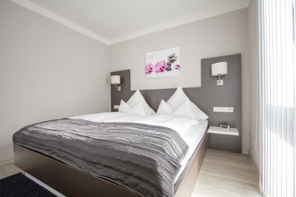Aparthotel "Am Fliess" Хойерсверда Стая снимка